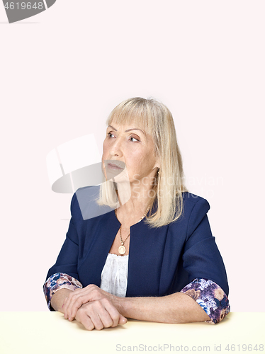 Image of Senior woman thinking about her sad life.