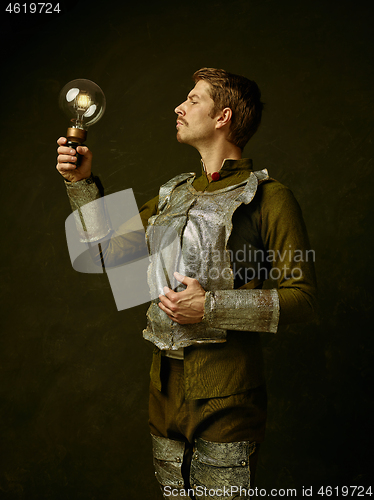 Image of Medieval knight on dark background.