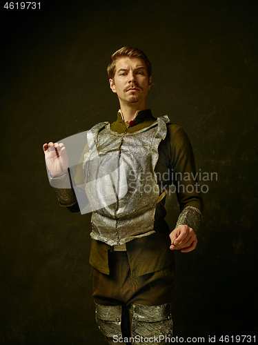 Image of Medieval knight on dark background.