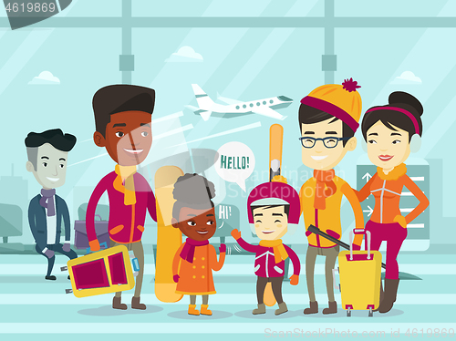 Image of Multiethnic tourists standing in airport in winter