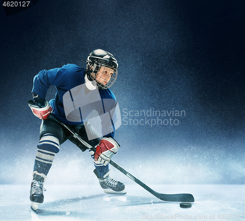 Image of Little boy playing ice hockey