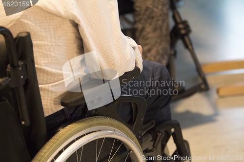 Image of Wheelchair by the Table