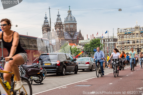 Image of People riding bicycles in Amsterdam