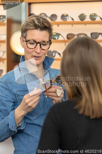 Image of woman in a eyewear store