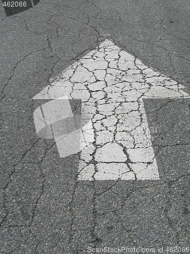Image of white arrow sign