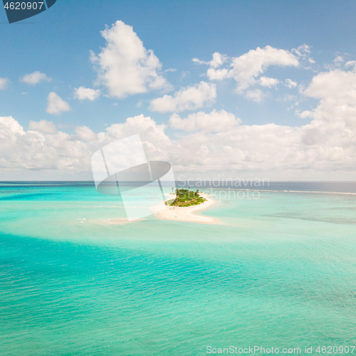 Image of Picture perfect beach and turquoise lagoon on small tropical island on Maldives
