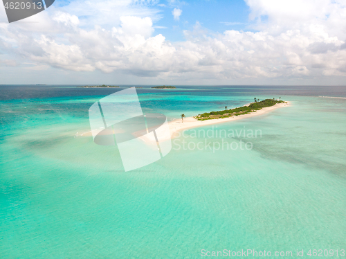 Image of Picture perfect beach and turquoise lagoon on small tropical island on Maldives