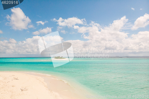 Image of Picture perfect beach and turquoise lagoon on small tropical island on Maldives