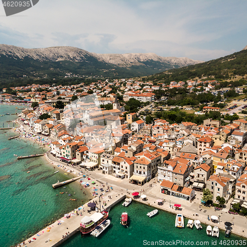 Image of Aerial panoramic view of Baska town, popular touristic destination on island Krk, Croatia, Europe.