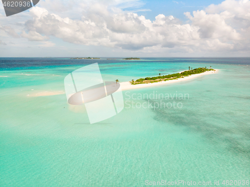 Image of Picture perfect beach and turquoise lagoon on small tropical island on Maldives