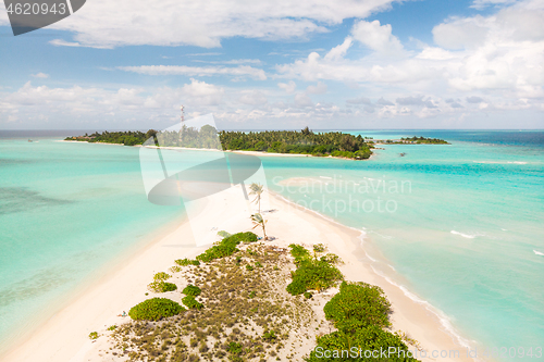 Image of Picture perfect beach and turquoise lagoon on small tropical island on Maldives