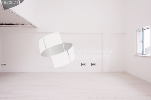 Image of Interior of empty stylish modern open space two level apartment