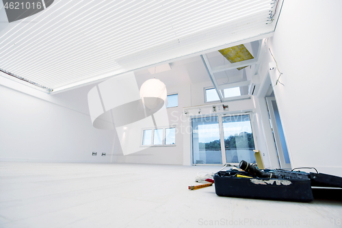 Image of Interior of empty stylish modern open space two level apartment