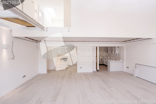 Image of Interior of empty stylish modern open space two level apartment