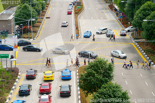 Image of People crossing multilane road. Singapore