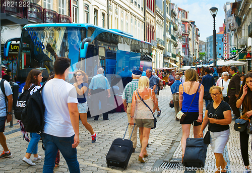 Image of Tourist arrives in Porto, Portugal