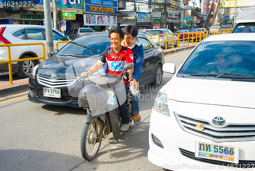 Image of Scooter riding in Thailand