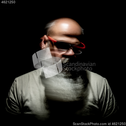 Image of bearded man motion blur portrait