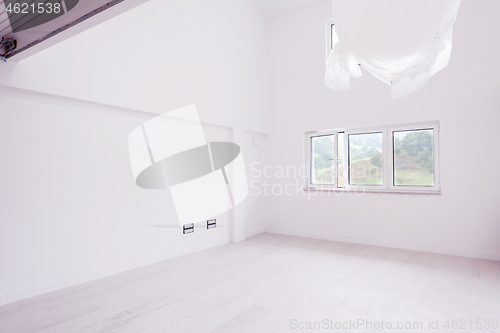 Image of Interior of empty stylish modern open space two level apartment