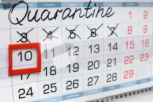 Image of Quarantine calendar and crossed out days of the week