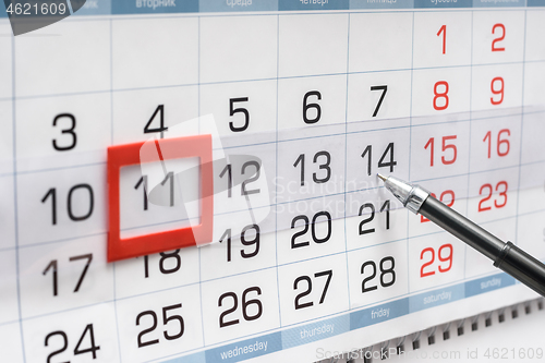 Image of Pen indicates future friday on wall calendar