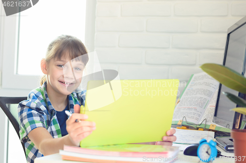 Image of Girl communicates by video with friends during the quarantine period