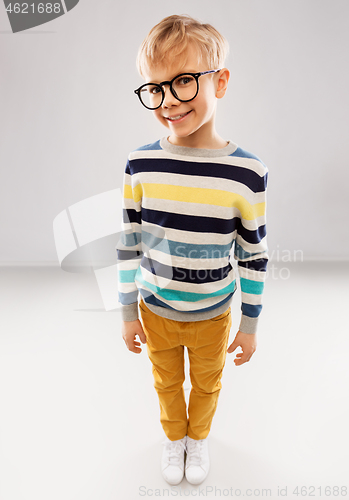 Image of smiling boy in glasses and striped pullover