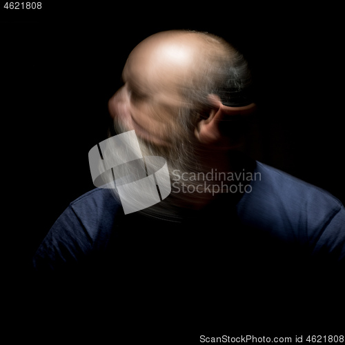 Image of bearded man motion blur portrait