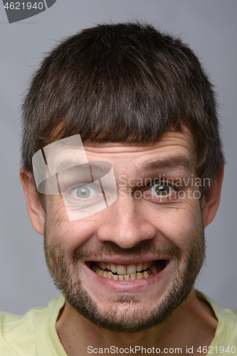 Image of Closeup portrait of an insanely joyful man of European appearance