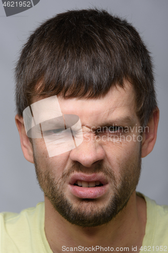 Image of Closeup portrait of an evil man of European appearance