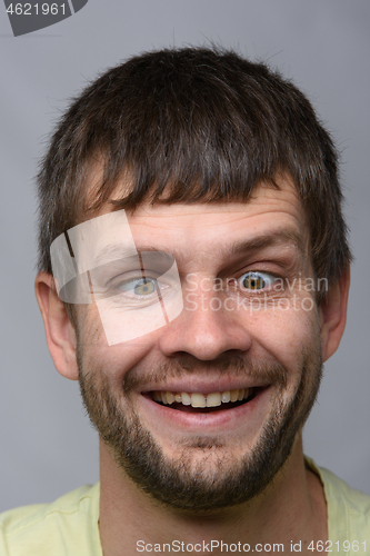 Image of Closeup portrait of a crazy man of European appearance