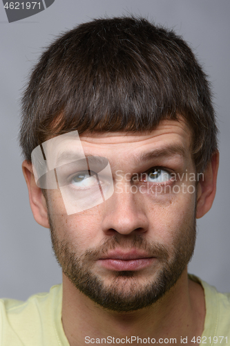 Image of Closeup portrait of a pensive man of European appearance