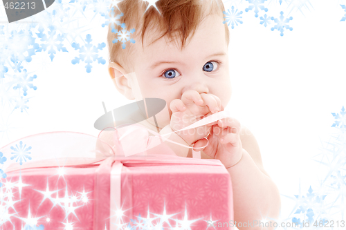 Image of baby boy with gift box