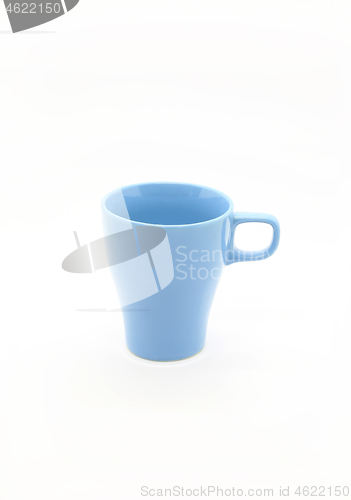 Image of Bright blue ceramic cup isolated on white background