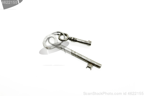 Image of Two very old keys on white background