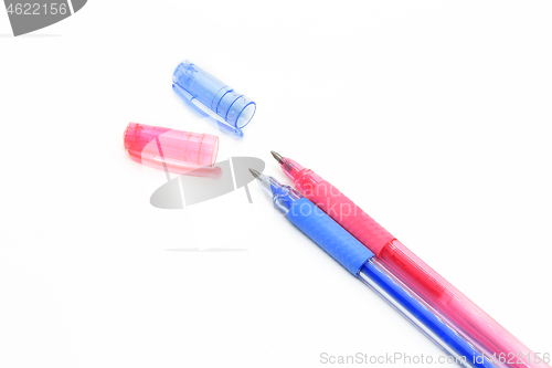 Image of Colorful gel pens with a cap on a white background