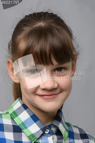 Image of Portrait of a cute ten year old girl, European appearance, close-up