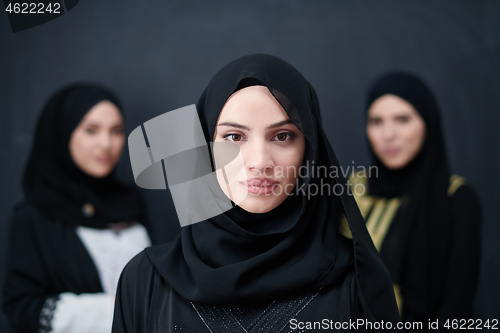 Image of portrait of beautiful muslim women in fashionable dress
