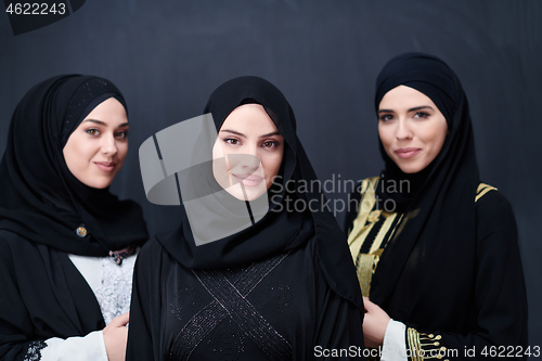 Image of portrait of beautiful muslim women in fashionable dress