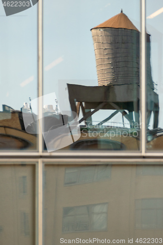 Image of typical water tank on the roof of a building in New York City