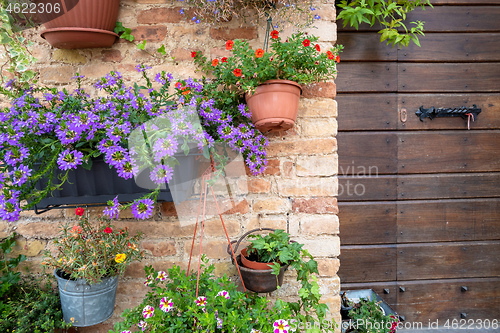 Image of house with flower decoration in Italy