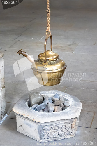 Image of holy water dispenser in a church in Muenster Germany