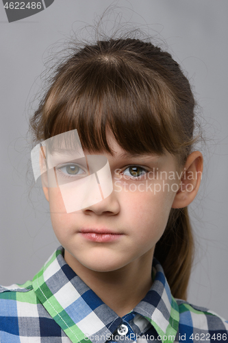 Image of Close-up portrait of a pretty ten year old girl