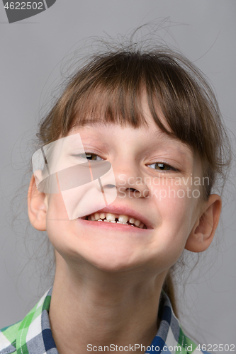 Image of Portrait of the happiest ten-year-old girl of European appearance, close-up