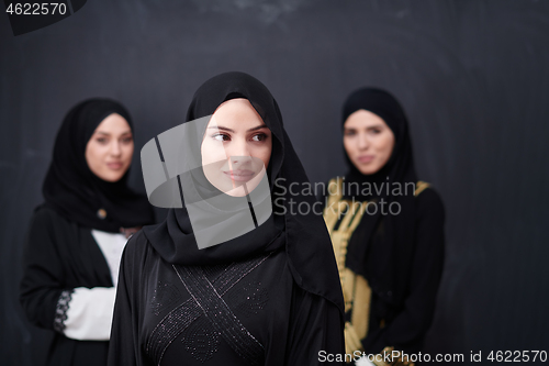 Image of portrait of beautiful muslim women in fashionable dress