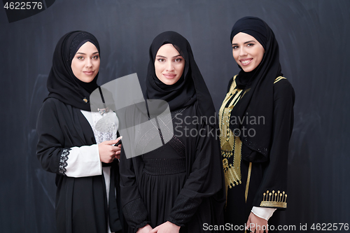 Image of portrait of beautiful muslim women in fashionable dress