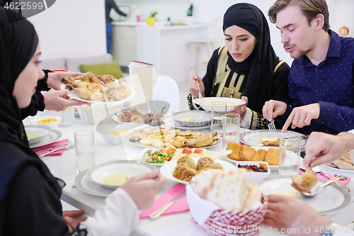 Image of muslim family having a Ramadan feast