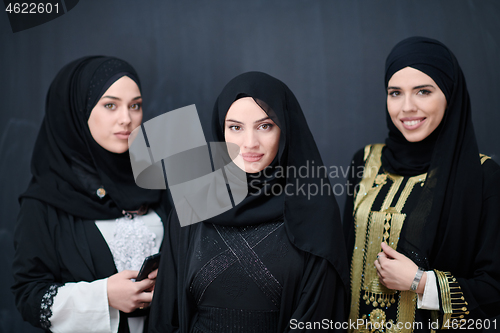 Image of portrait of beautiful muslim women in fashionable dress