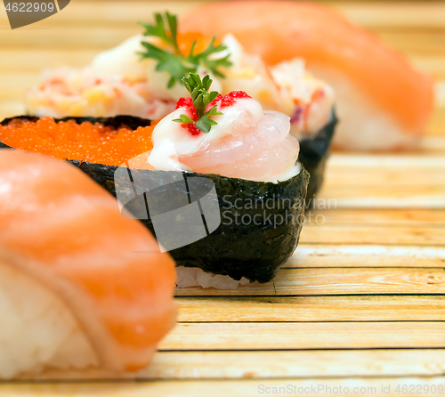 Image of Japanese Salmon Sushi Shows Asian Food And Cuisine 