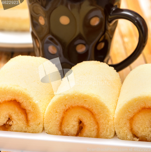 Image of Orange Flavored Cake Represents Coffee Swiss Roll And Beverage 